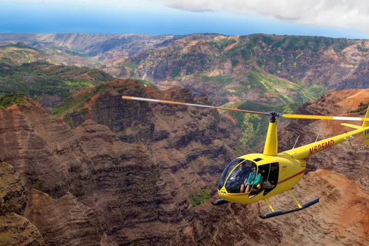 a small plane sitting on top of a mountain