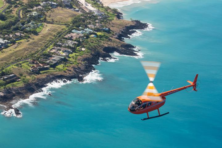 a plane flying over a body of water